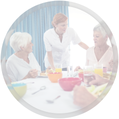 caregiver preparing food for her patients